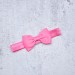 Blythe hot pink elasticized headband  with decorative bow